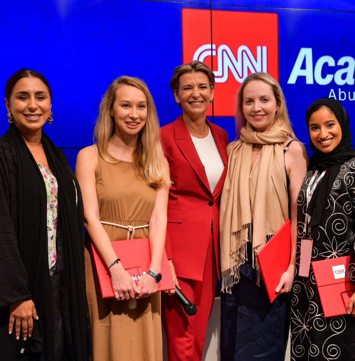CNN's Becky Anderson with the winners of the 2022 CNN Academy Newsroom Simulation Ayesha Alblooshi, Daria Tarasova, Kathy Rose O’Brien, Zainab Alattas.